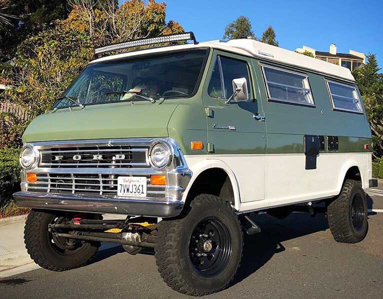 Green and white classic van converted by sportsmobile.